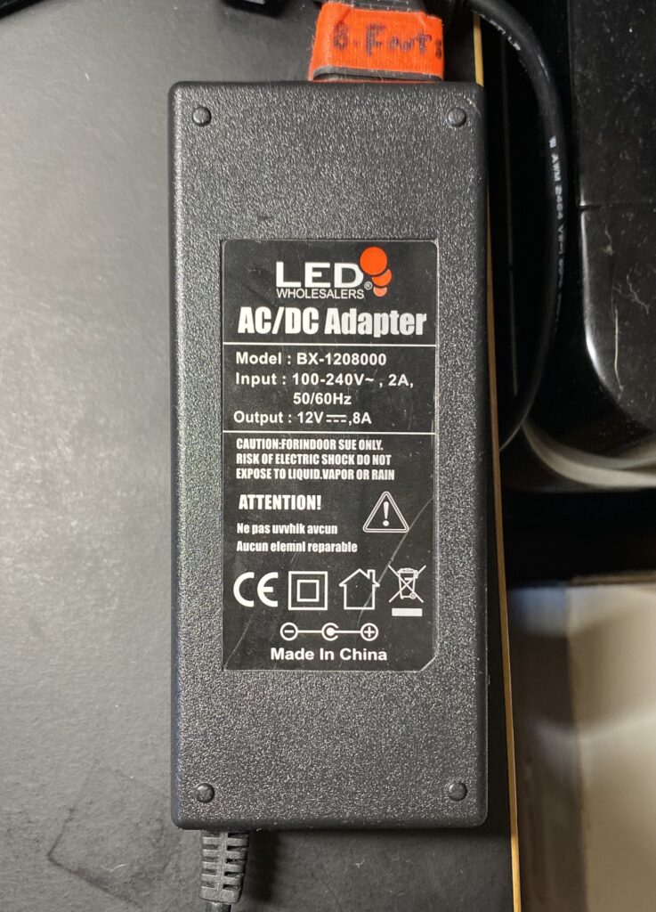 Information label on an AC/DC Power Adapter