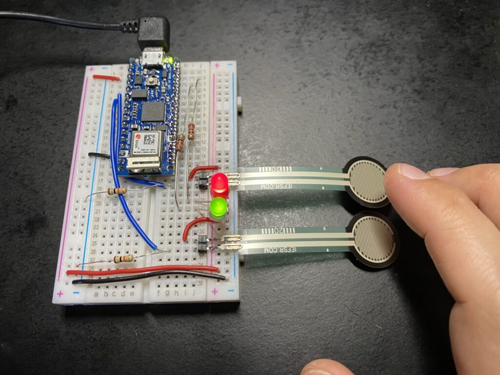 Both green and red LEDs lit with power supplied to Arduino